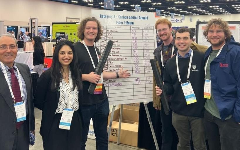 The SAMPE team at the 2025 competition in front of the Category A results board