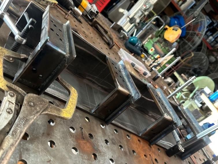 V2 beam aligner and clamp. Repeatability tooling, welded in-house.